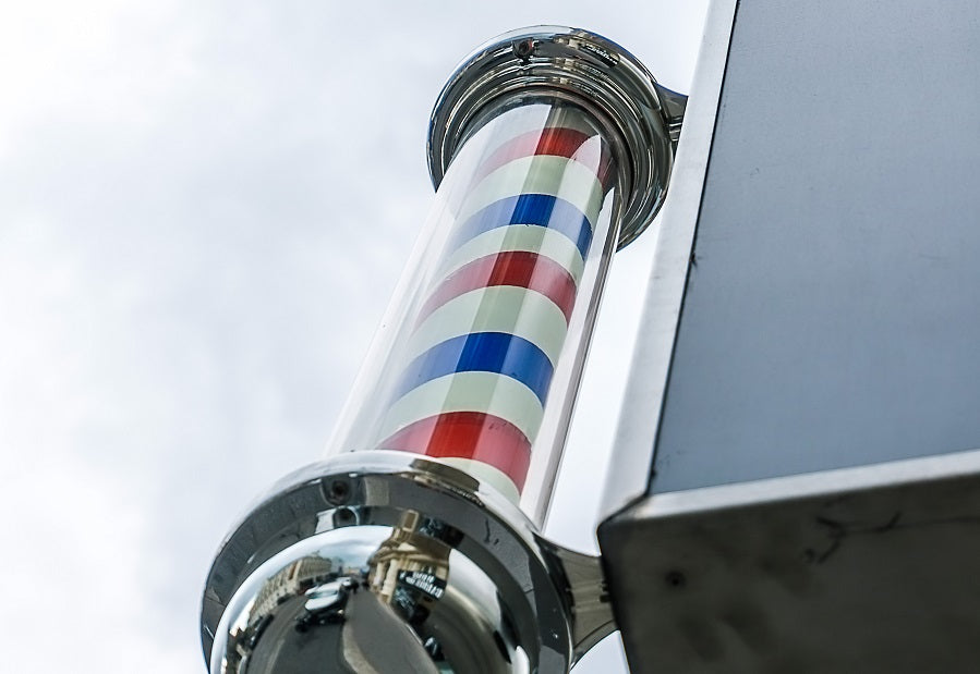 Barber pole outside in daytime